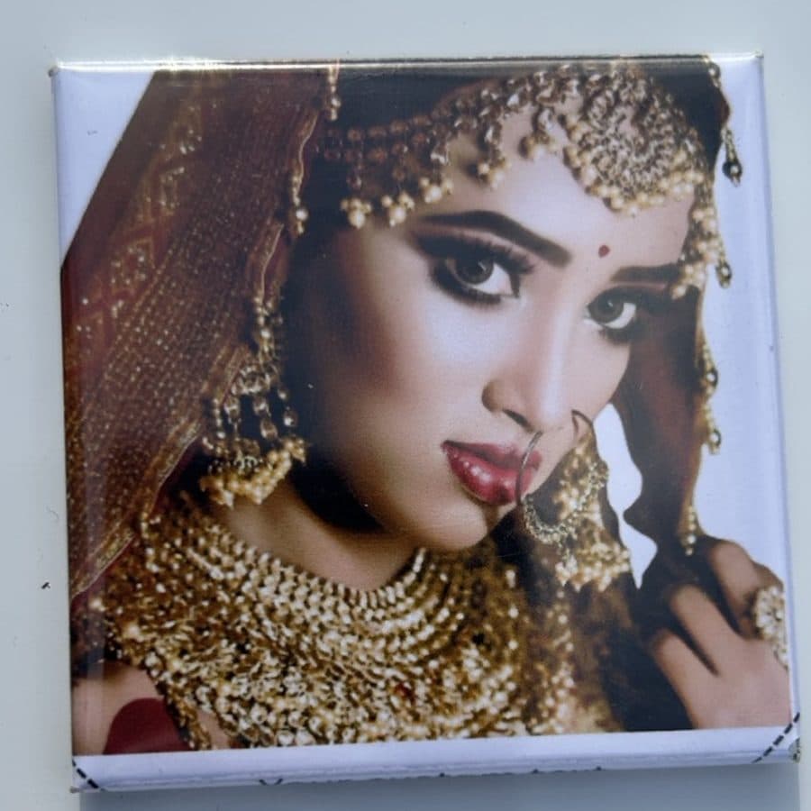 Finished photo magnet of a bride in gold bridal jewelry